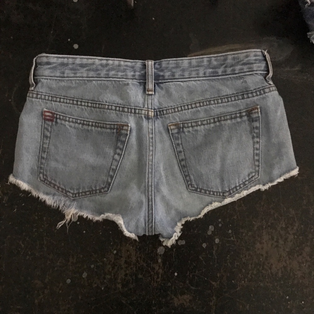 BDG low rise dolphin shorts size 24